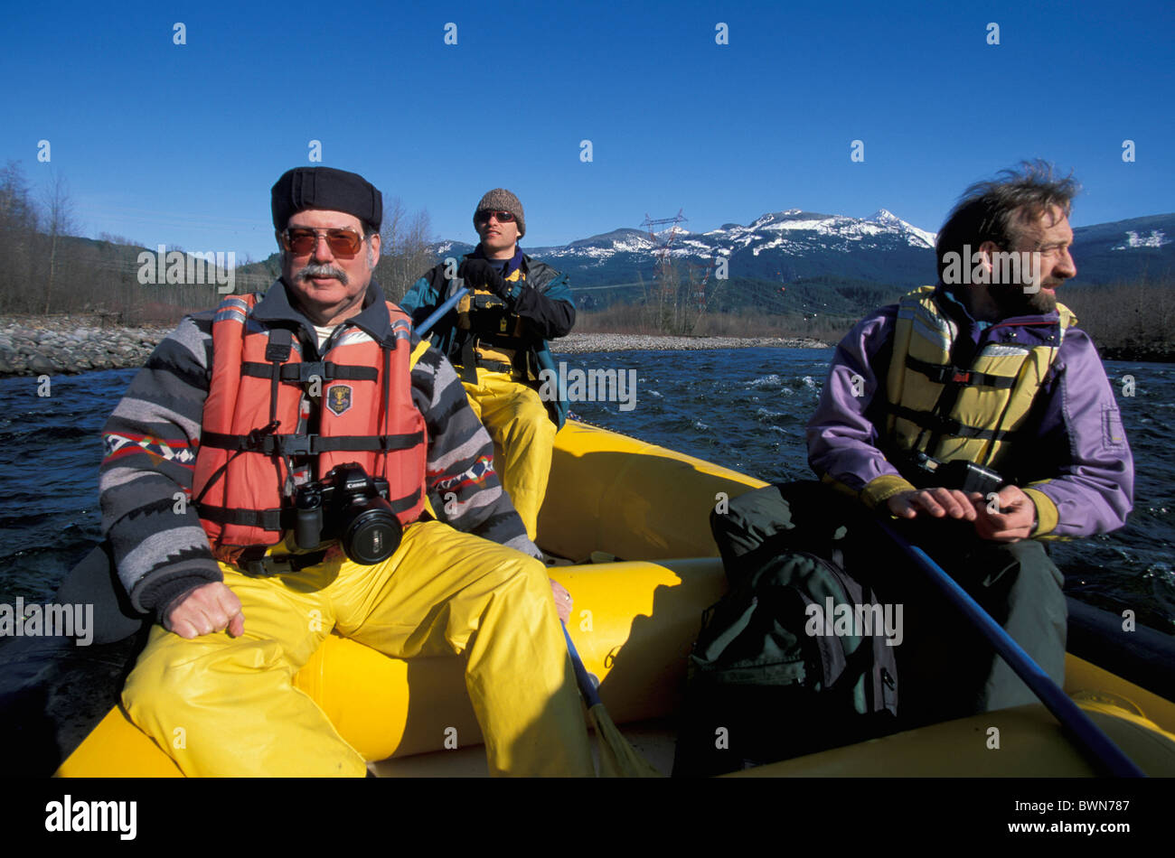 Canada North America America Rafting Squamish River Squamish British Columbia Boat dinghy photographer men Stock Photo
