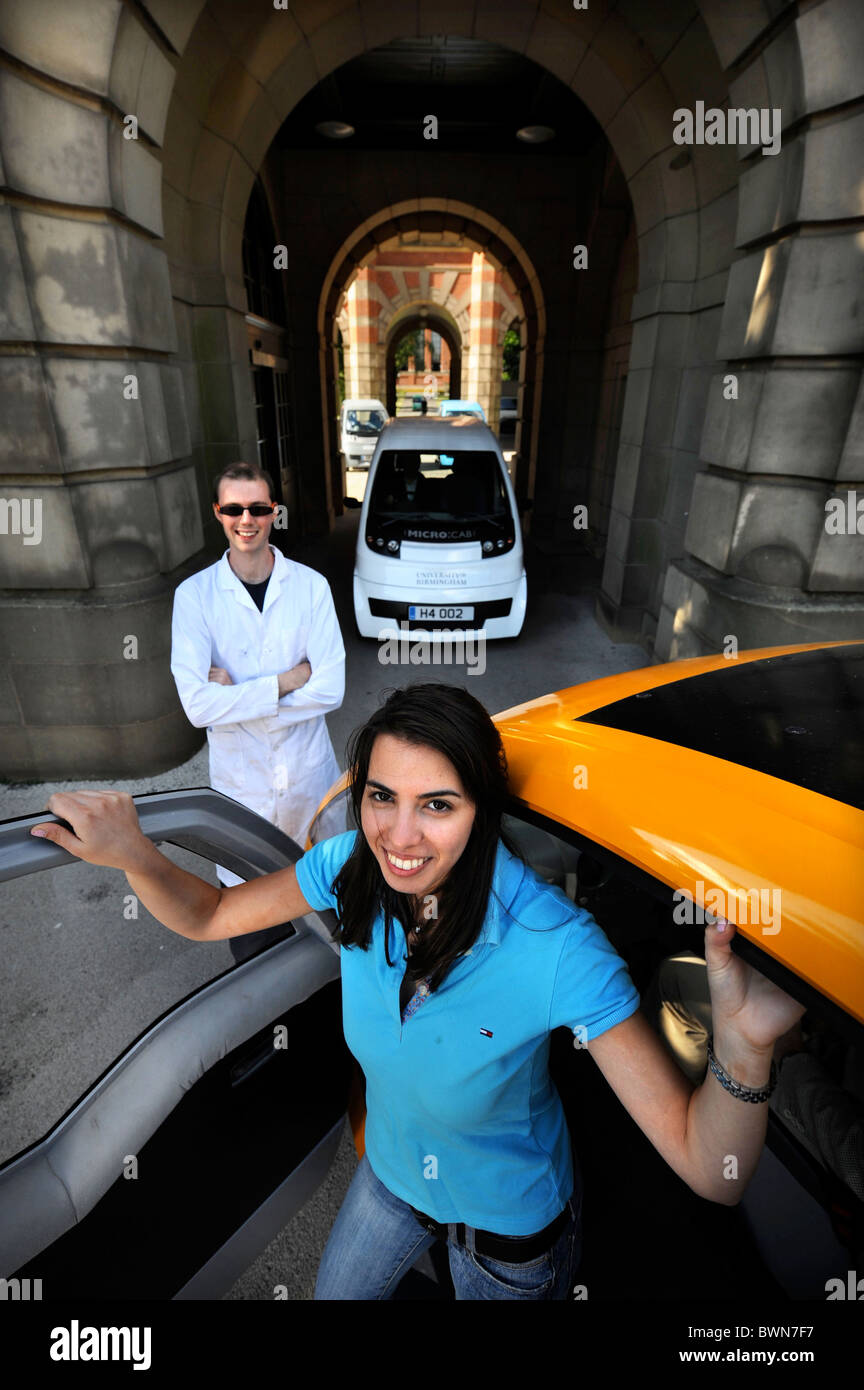 Chemical Engineering students with the fleet of hydrogen fuel cell 'Micro Cab' vehicles at the