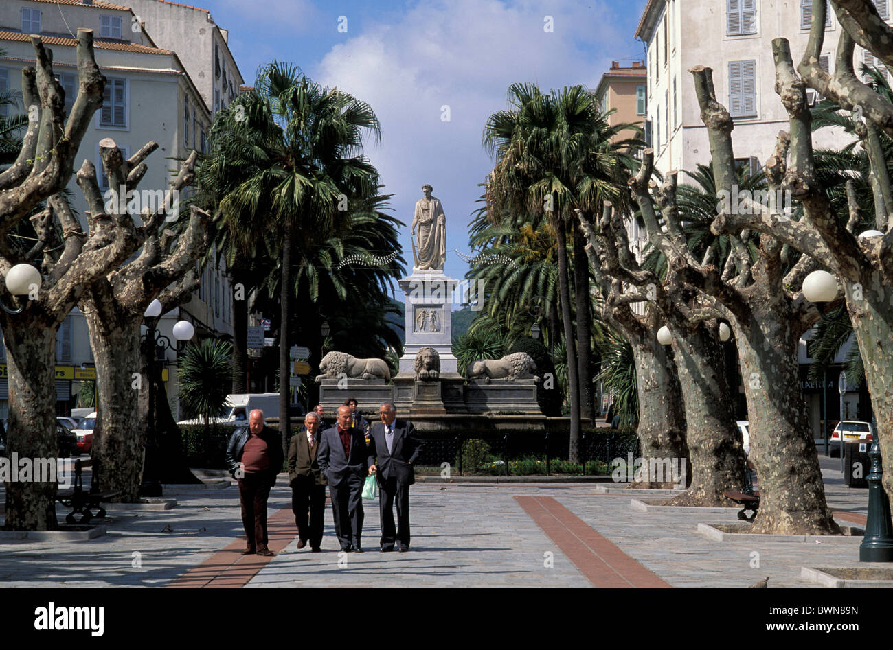 Corsica Ajaccio France Europe Place Foch people seniors trees monument square Stock Photo