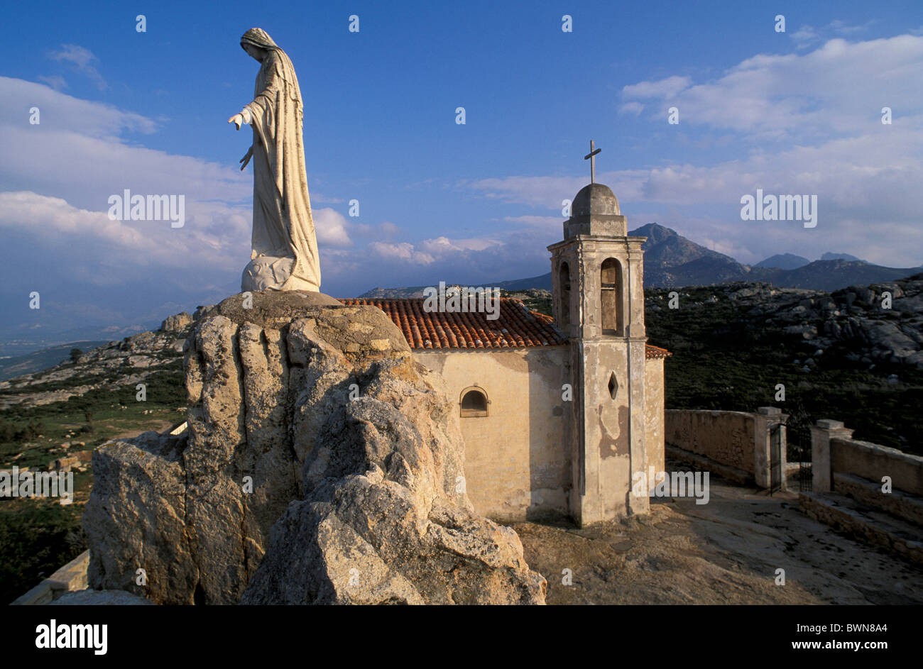 Corsica Madonna Statue Chapelle Notre Dame de la Serra near Calvi France Europe figure rock chapel religion Stock Photo
