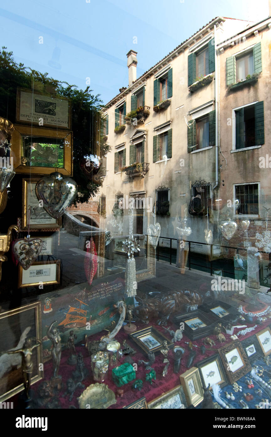 antique shop with reflexions sestiere dorsoduro near peggy gugenheim museum venice, italy 2010 Stock Photo