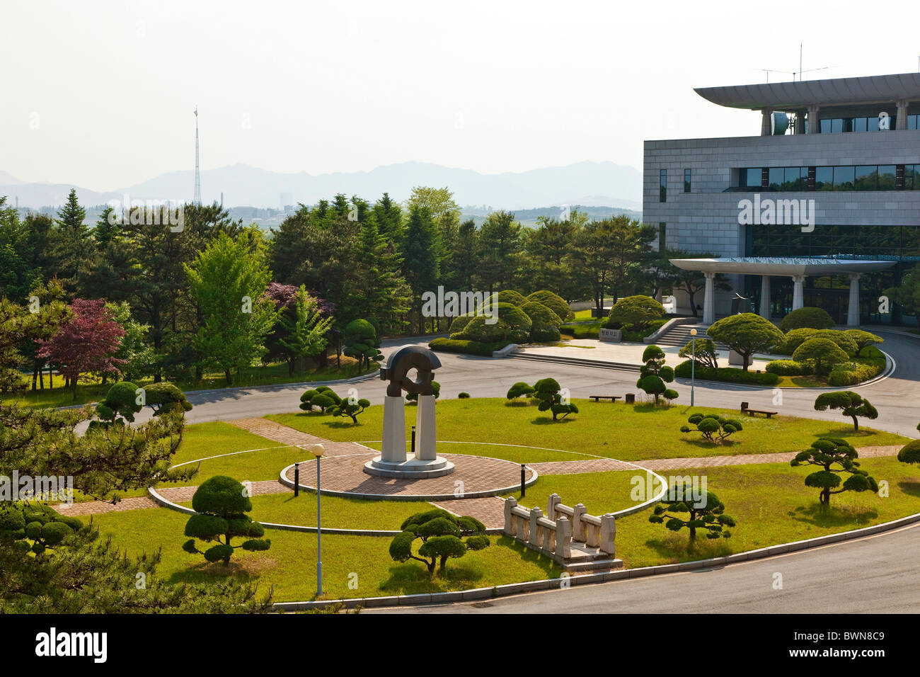 Freedom House looking over to North Korean Kijŏng-dong flagpole, JSA Joint Security Area, DMZ, South Korea. JMH3842 Stock Photo
