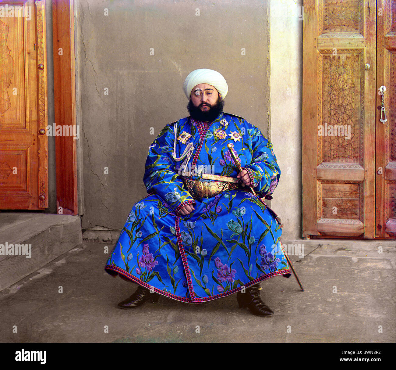 Alim Khan Emir of Bukhara 1911 sitting costume portrait holding sword Russian Empire Uzbekistan today Sergey Stock Photo
