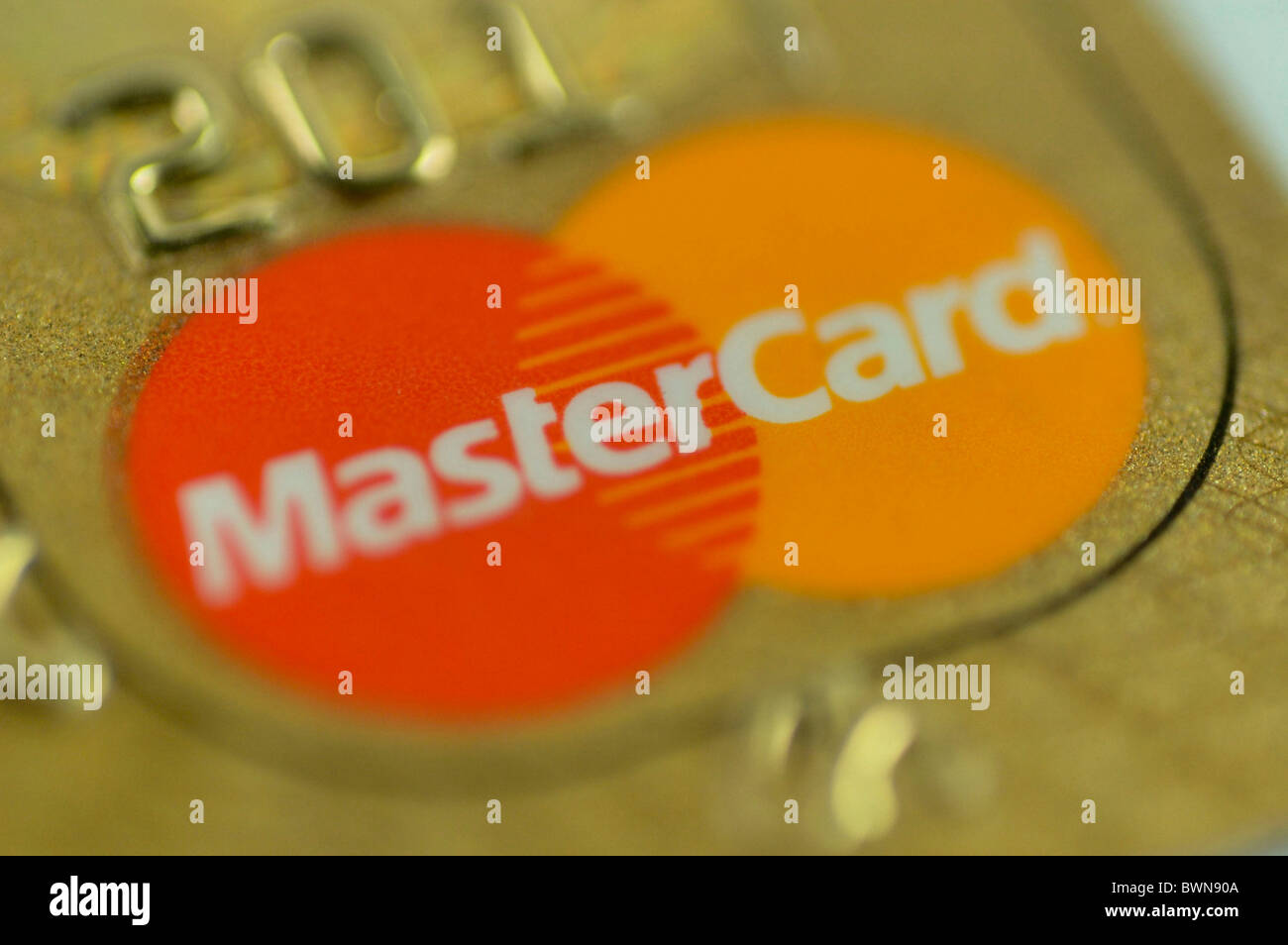 Mastercard Eurocard credit card gold golden valuable credit debts make spend Luxux pay trust trustworthil Stock Photo