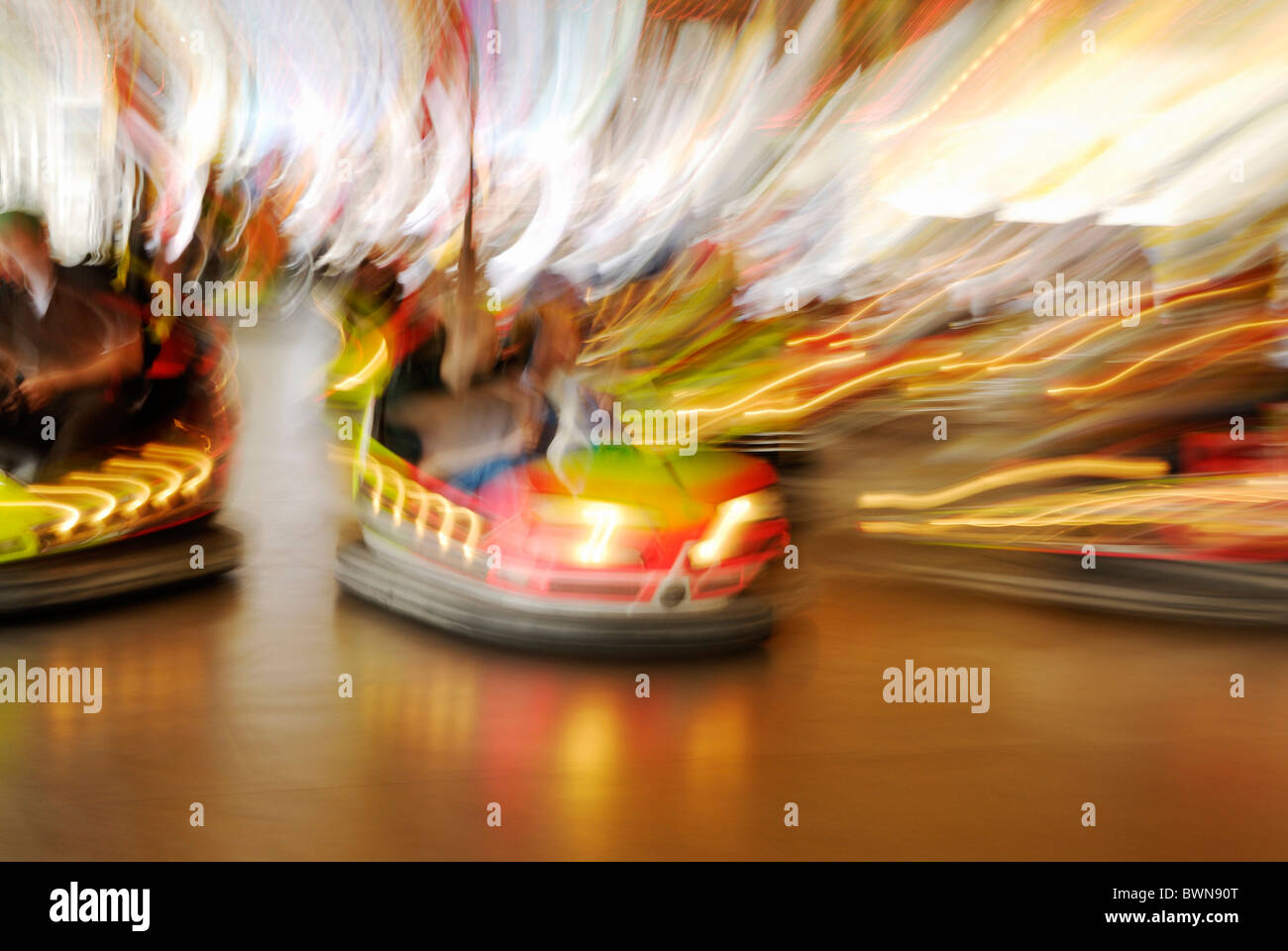 bumper car dodgem cars fair drive driving color colour colours fun moving move try trying happy leisure Stock Photo