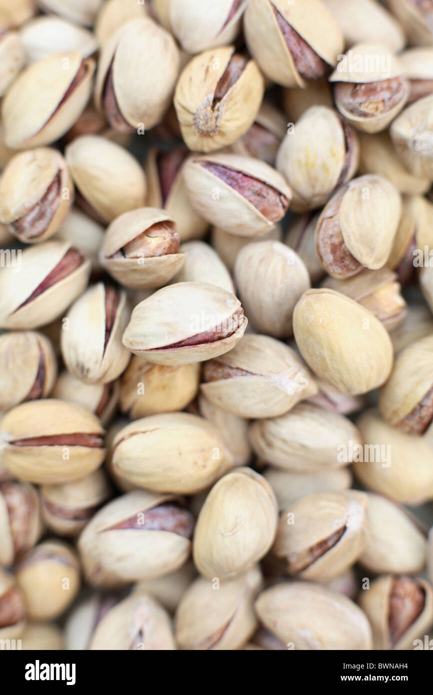 pistachio nuts roasted in their shells Stock Photo Alamy