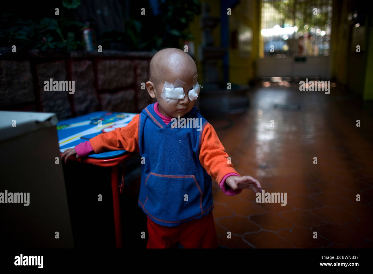 A blind girl walks in a shelter for chronically ill children in Mexico City, Mexico. Stock Photo