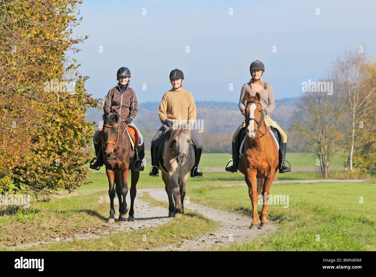 Three Riders On Horses Stock Photos & Three Riders On Horses Stock ...