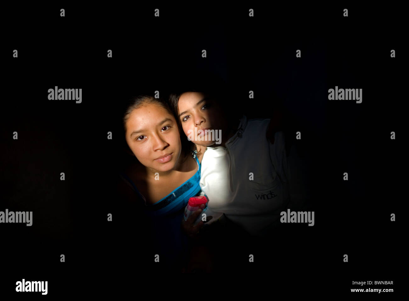 Two young girls pose in a shelter for chronically ill children run by the San Judas Tadeo Foundation in Mexico City, Mexico. Stock Photo