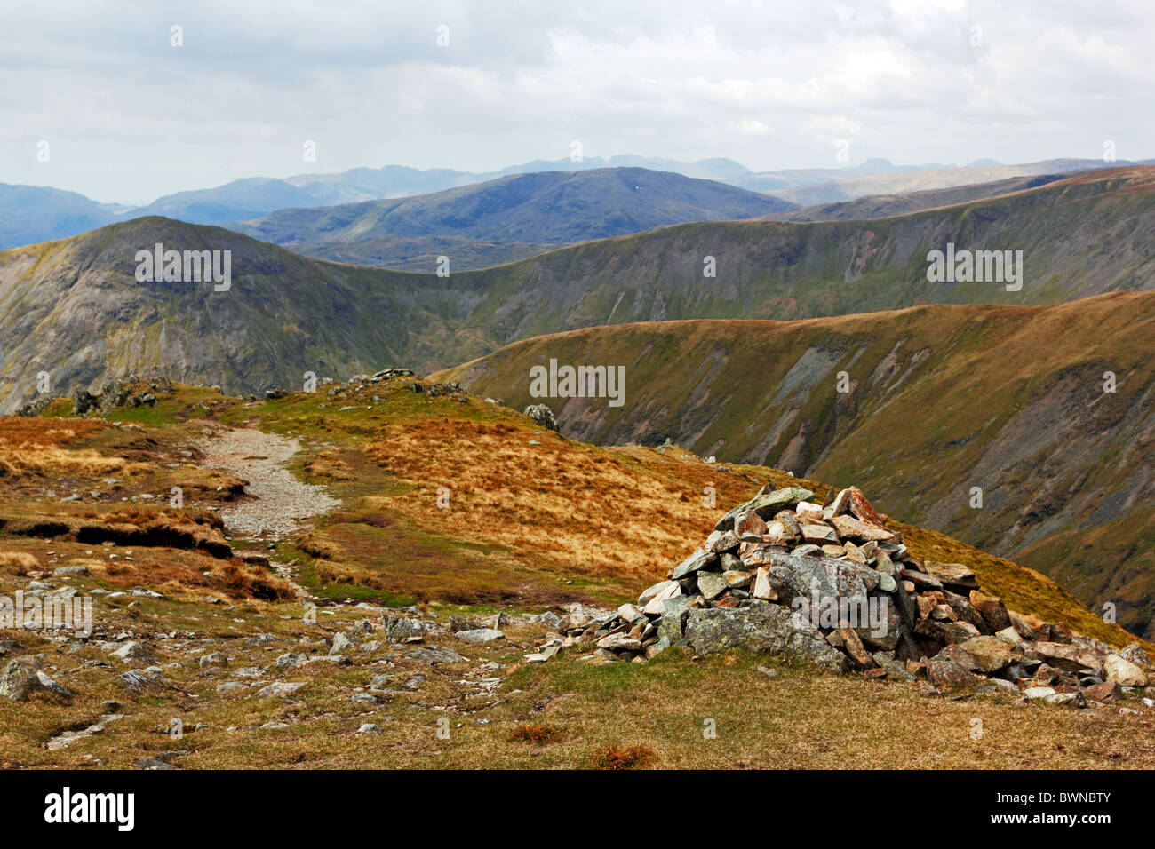 Cairn on the path to the summit of Harter Fell in the Lake District National Park, Cumbria, England. Stock Photo