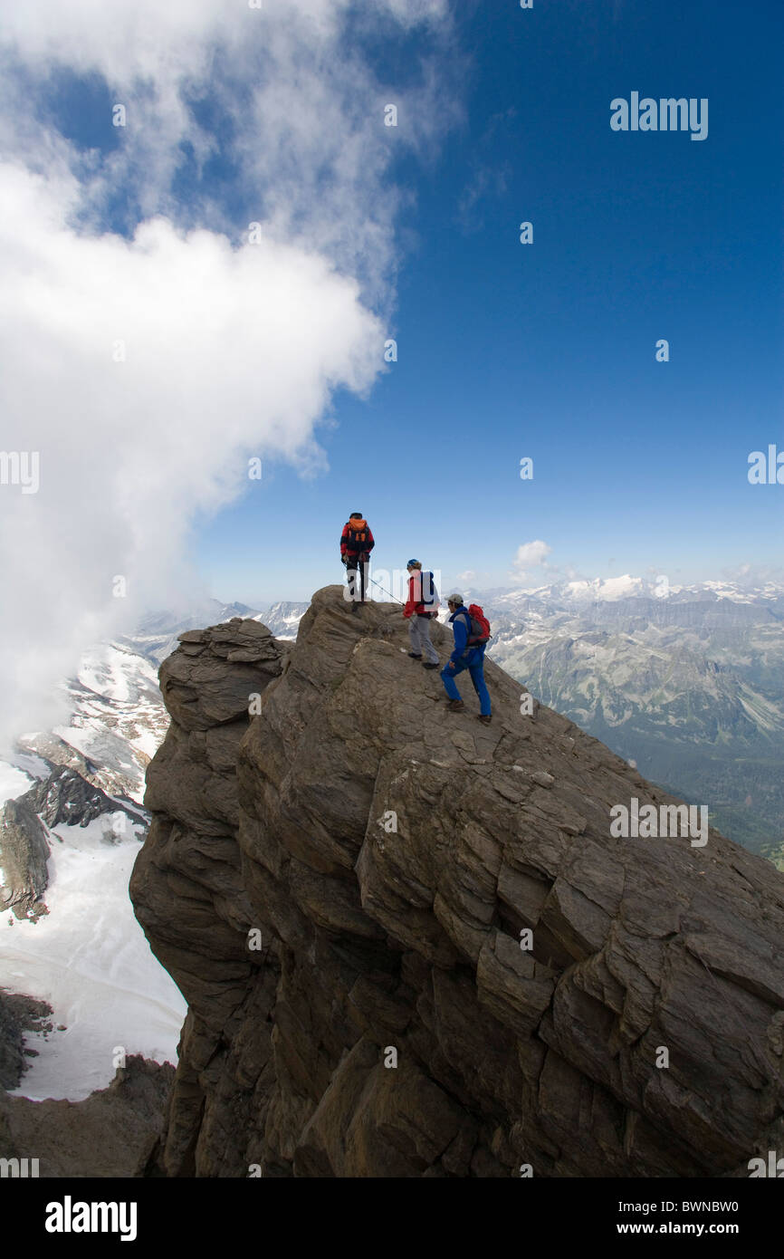 Austria Europe Kitzsteinhorn Kaprun Salzburg climbing rope team group hiker hikers hiking summit peak roc Stock Photo