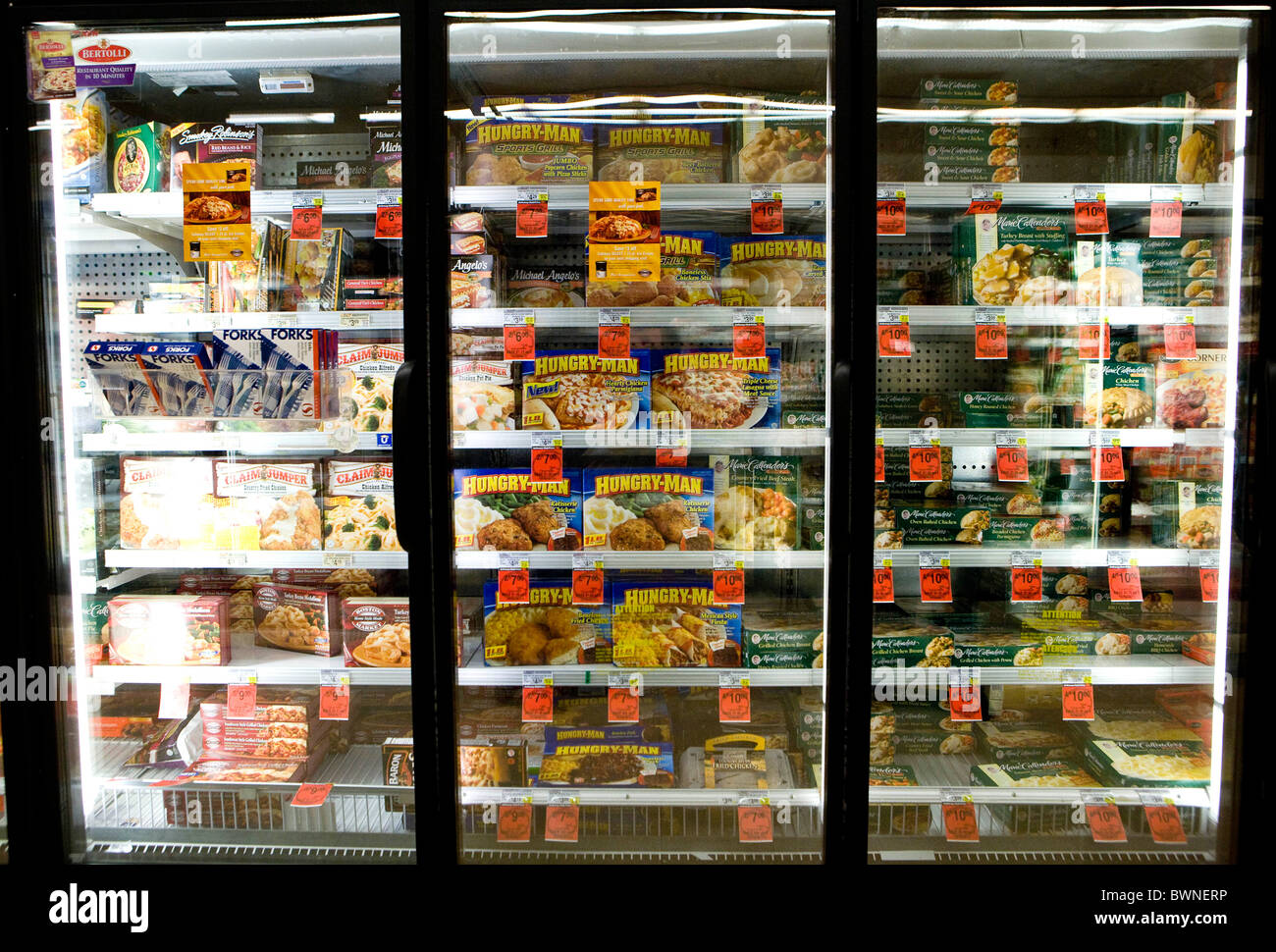 The frozen food display in a grocery store. Stock Photo