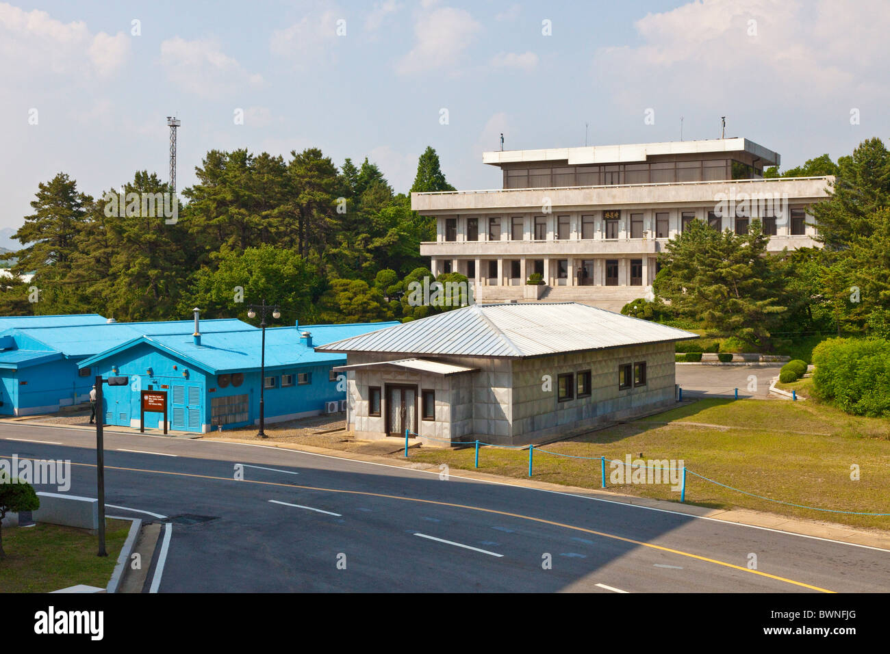 Looking over UN buildings to North Korean Panmon Hall building in JSA Joint Security Area, DMZ Demilitarized Zone. JMH3846 Stock Photo