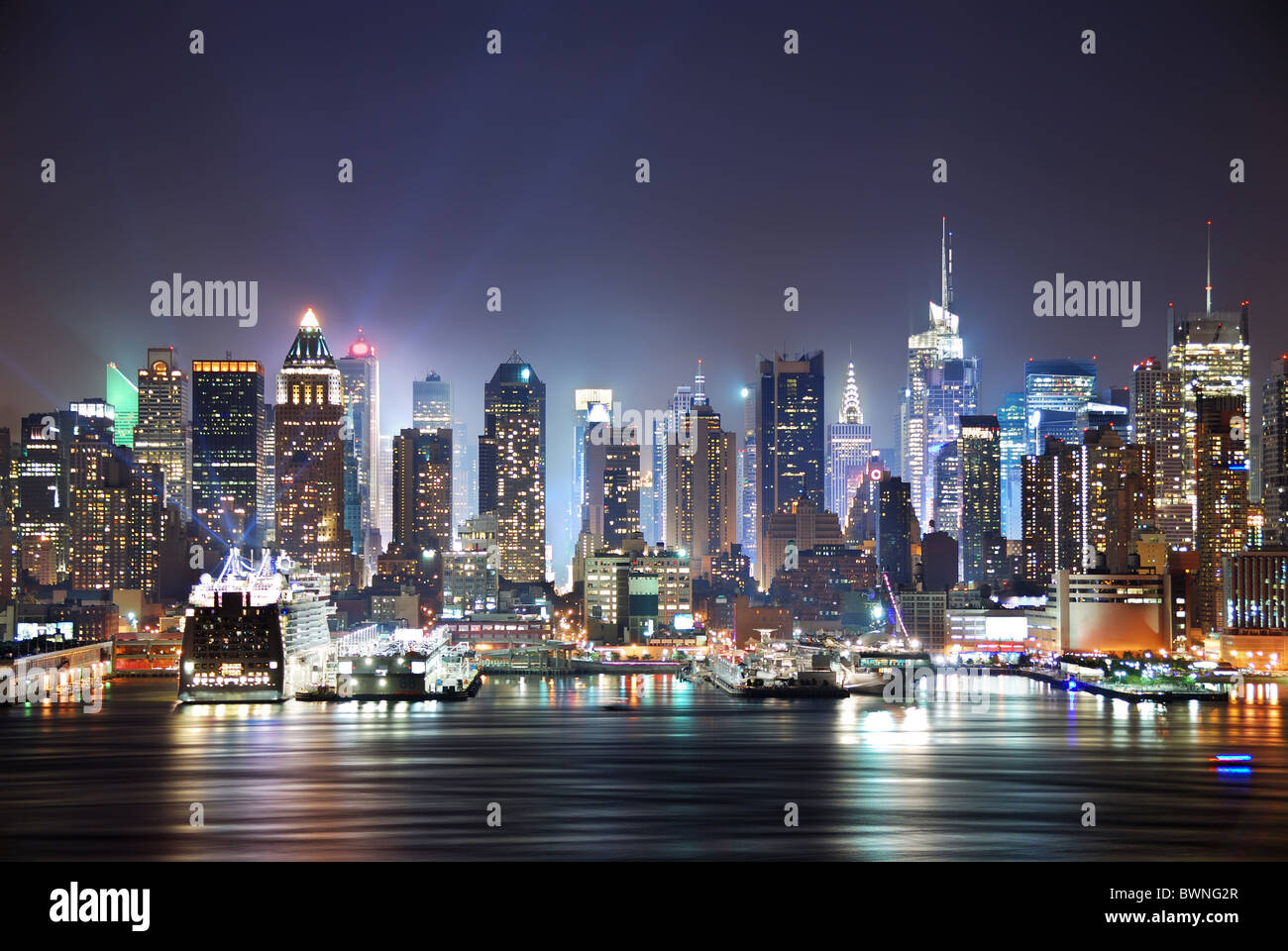 New York City Manhattan skyline panorama at night over Hudson River ...
