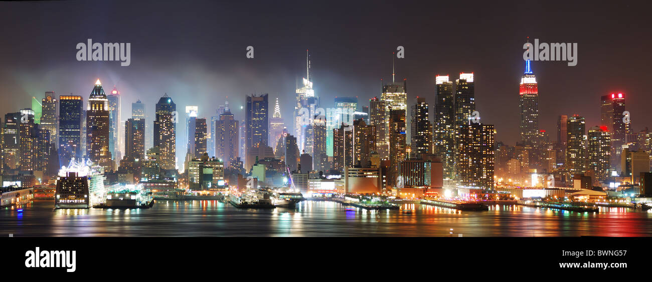New York City Manhattan skyline panorama at night over Hudson River ...
