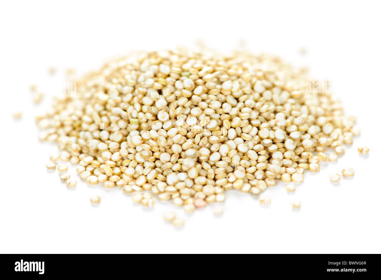 Pile of quinoa grain on white background Stock Photo