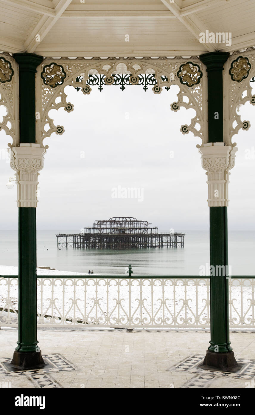 The shell of Brighton's west pier photographed from the Bedford square bandstand, known locally as the Birdcage Stock Photo