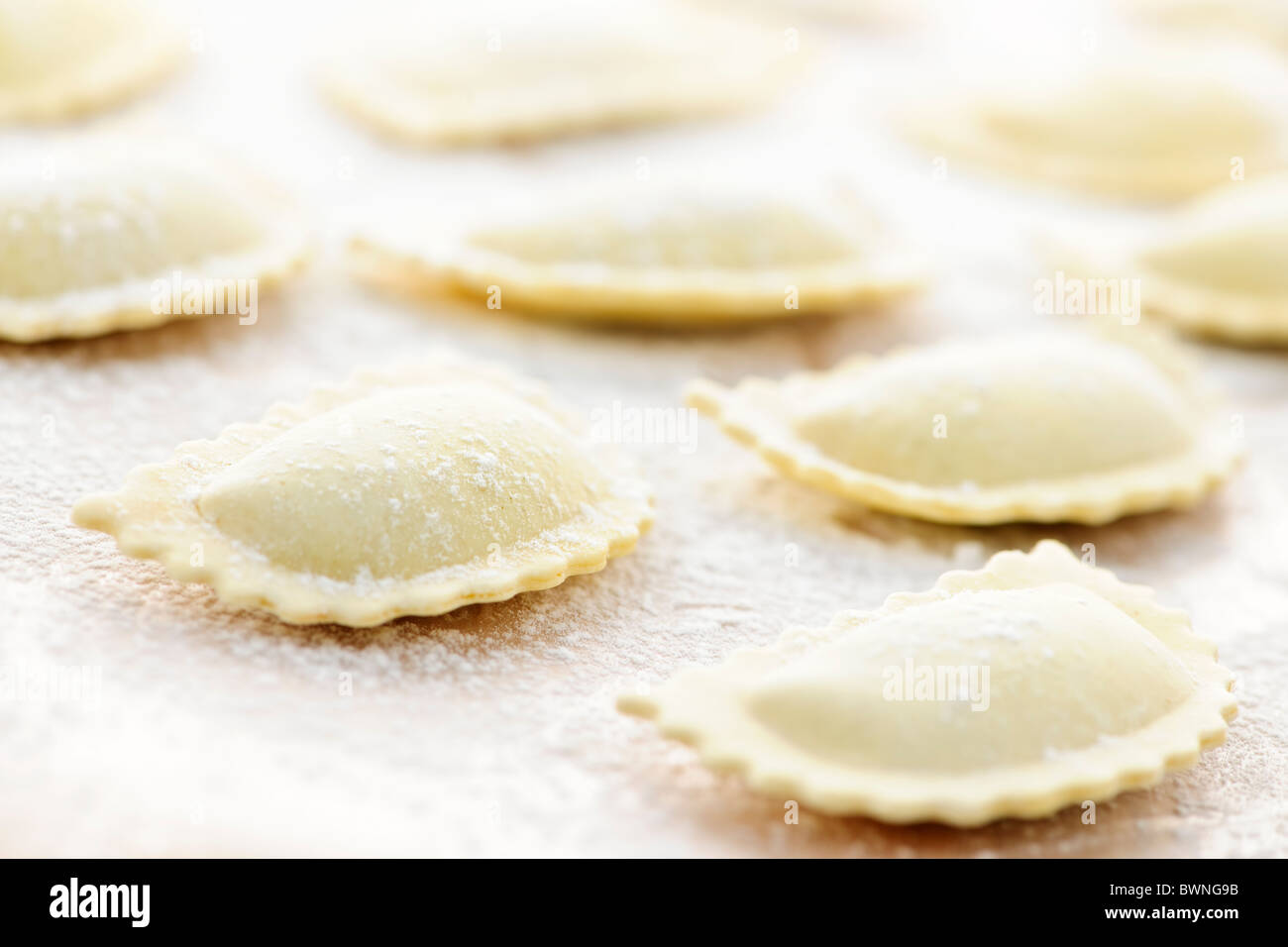 Uncooked ravioli pasta prepared and ready for cooking Stock Photo