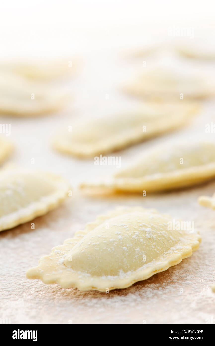 Uncooked ravioli pasta prepared and ready for cooking Stock Photo