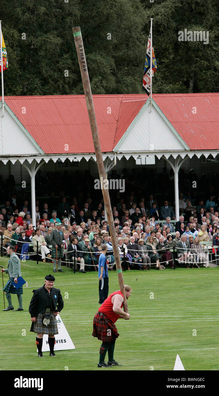 Test of strength Tossing the Caber contest at the Braemar Games Highland gathering Stock Photo