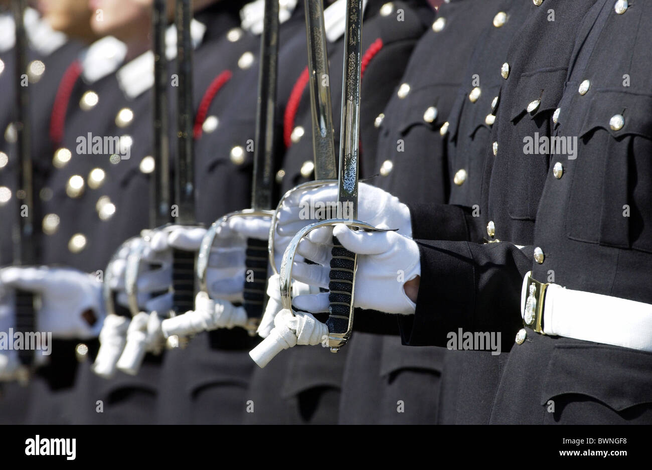 Detail of gloves and swords as the Passing Out Parade at Sandhurst Royal Military Academy, Surrey. Stock Photo