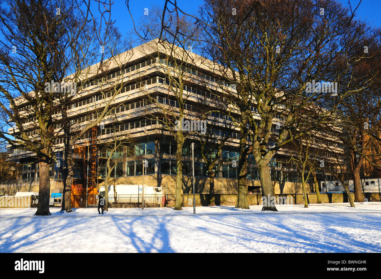 Main Library Square in snow as seen from The Meadows Edinburgh University architect