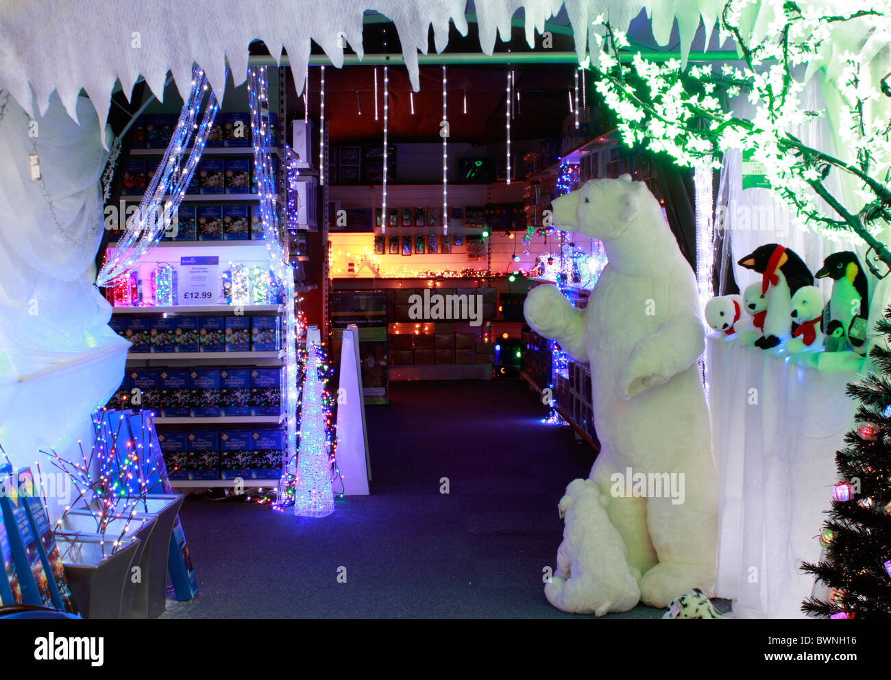 Christmas lighting grotto. guarded by a polar bear Stock Photo