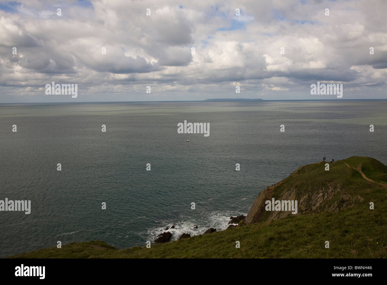 Climbers at Baggy Point, Devon, UK Stock Photo