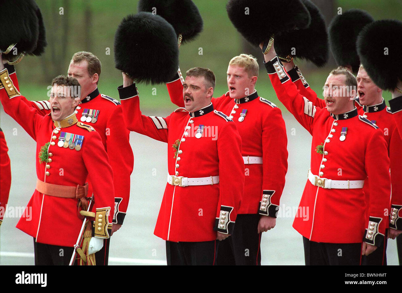 Officers of the 1st Battalion Irish Guards at Elizabeth Barracks, Pirbright, Surrey cheering on St Patrick's Day Stock Photo