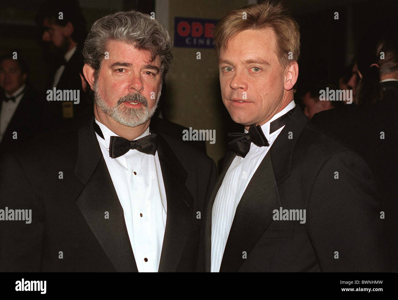 GEORGE LUCAS ,THE MOVIE CREATOR, [LEFT] AND MARK HAMILL (LUKE SKYWALKER) AT LONDON PREMIERE OF THE FILM 'STAR WARS' Stock Photo