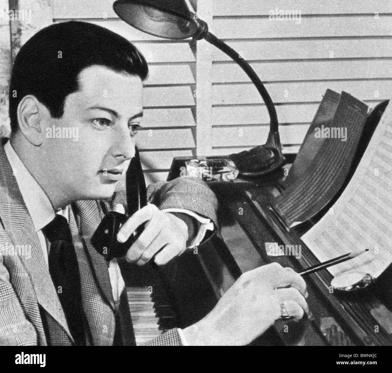 Early 1950s publicity image of musician, composer, and conductor Andre  Previn Stock Photo - Alamy