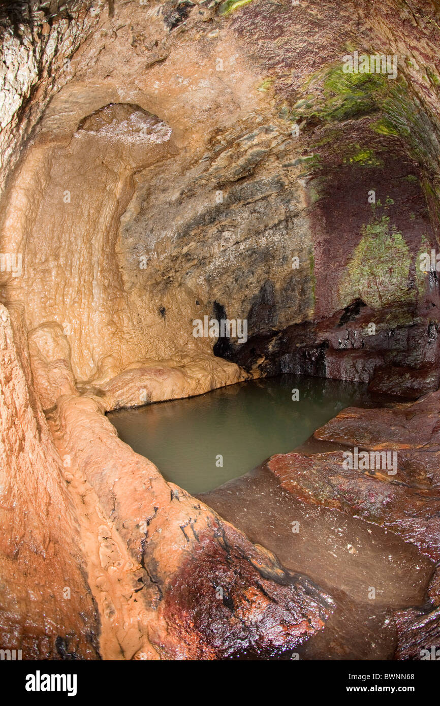 Stackhouse Cave; a bath cut into the cliff for the Acton family; Cornwall Stock Photo