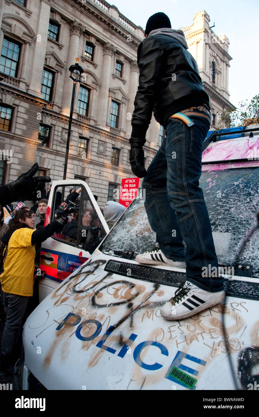 Vandalized Police van when left in middle of kettled students protesting against increase in tuition fees. Whitehall  London 24. Stock Photo