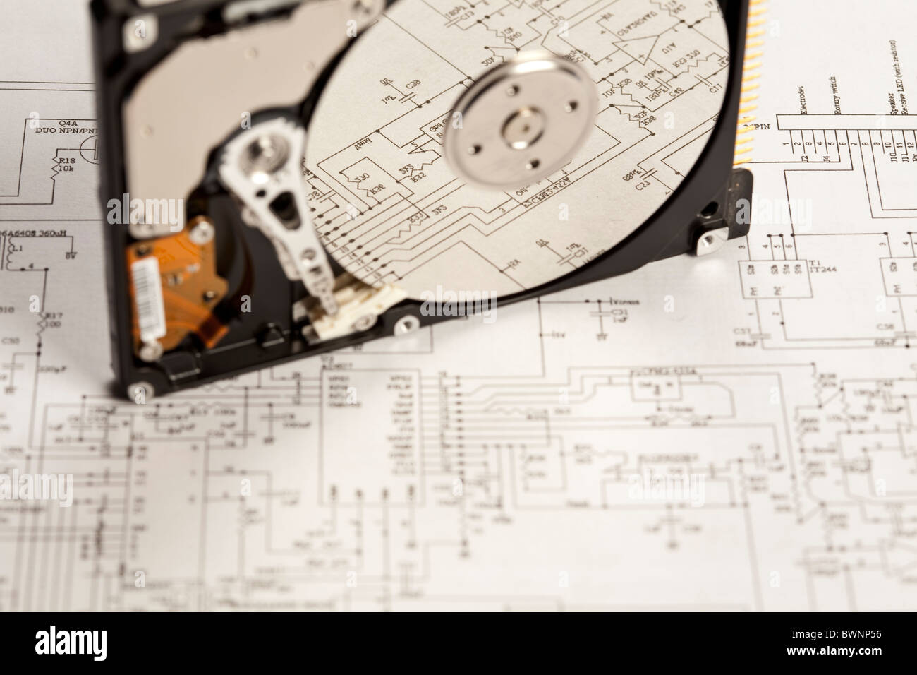 Electronic components on a schematic diagram background. Stock Photo