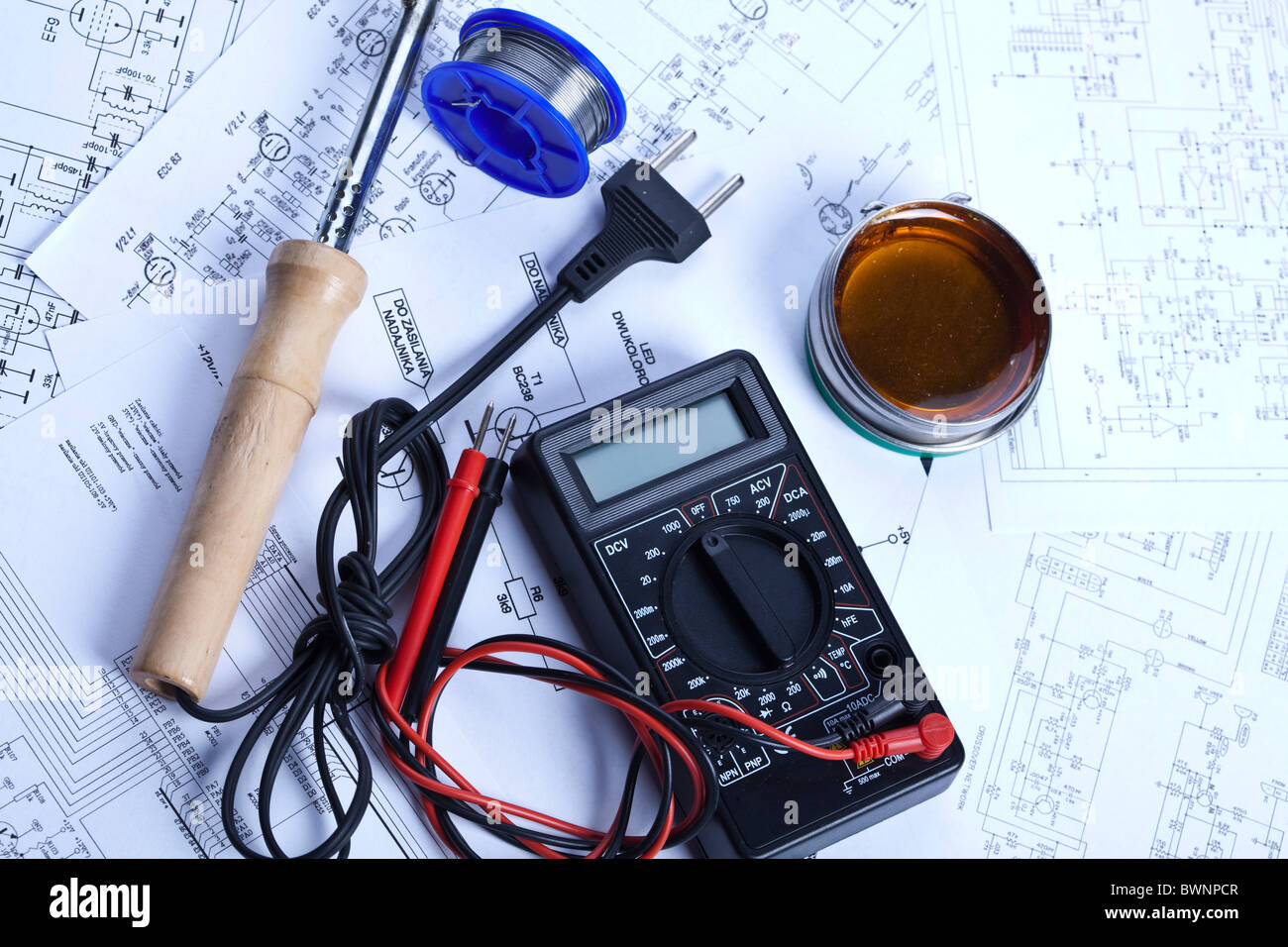 Electronic components on a schematic diagram background. Stock Photo