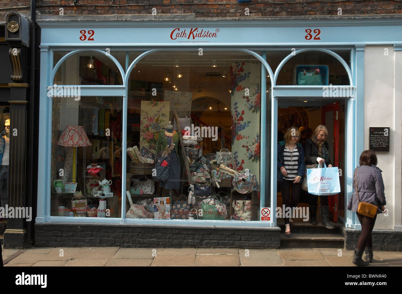 Shoppers exiting a Cath Kidston shop in York carrying Cath Kidston bag  Stock Photo - Alamy