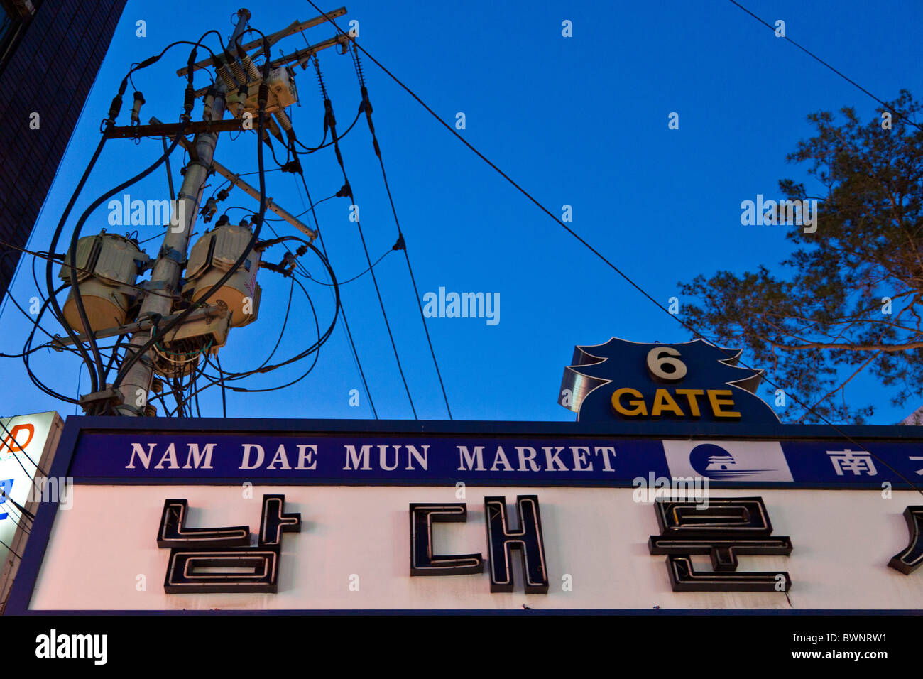 Electrical sub-station on pole at Namdaemun market Gate 6 in Seoul South Korea at dusk. JMH3850 Stock Photo