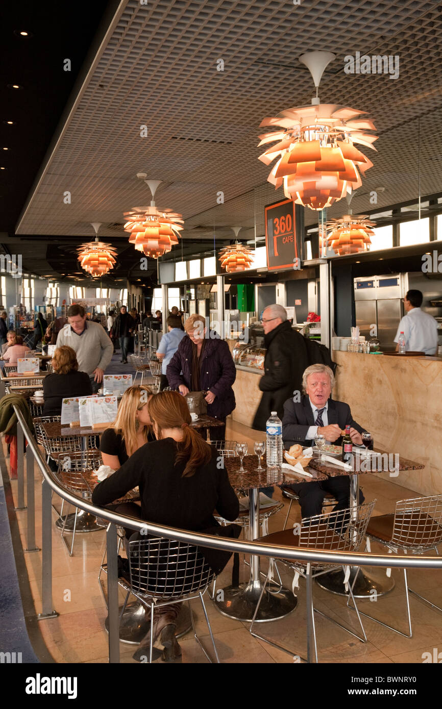 People eating and drinking at the 360 degree cafe on the 56th floor of the Montparnasse Tower, Paris, France Stock Photo