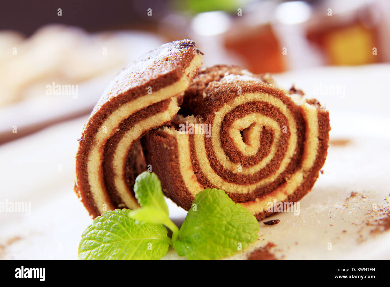 Slice of sponge cake roll Stock Photo