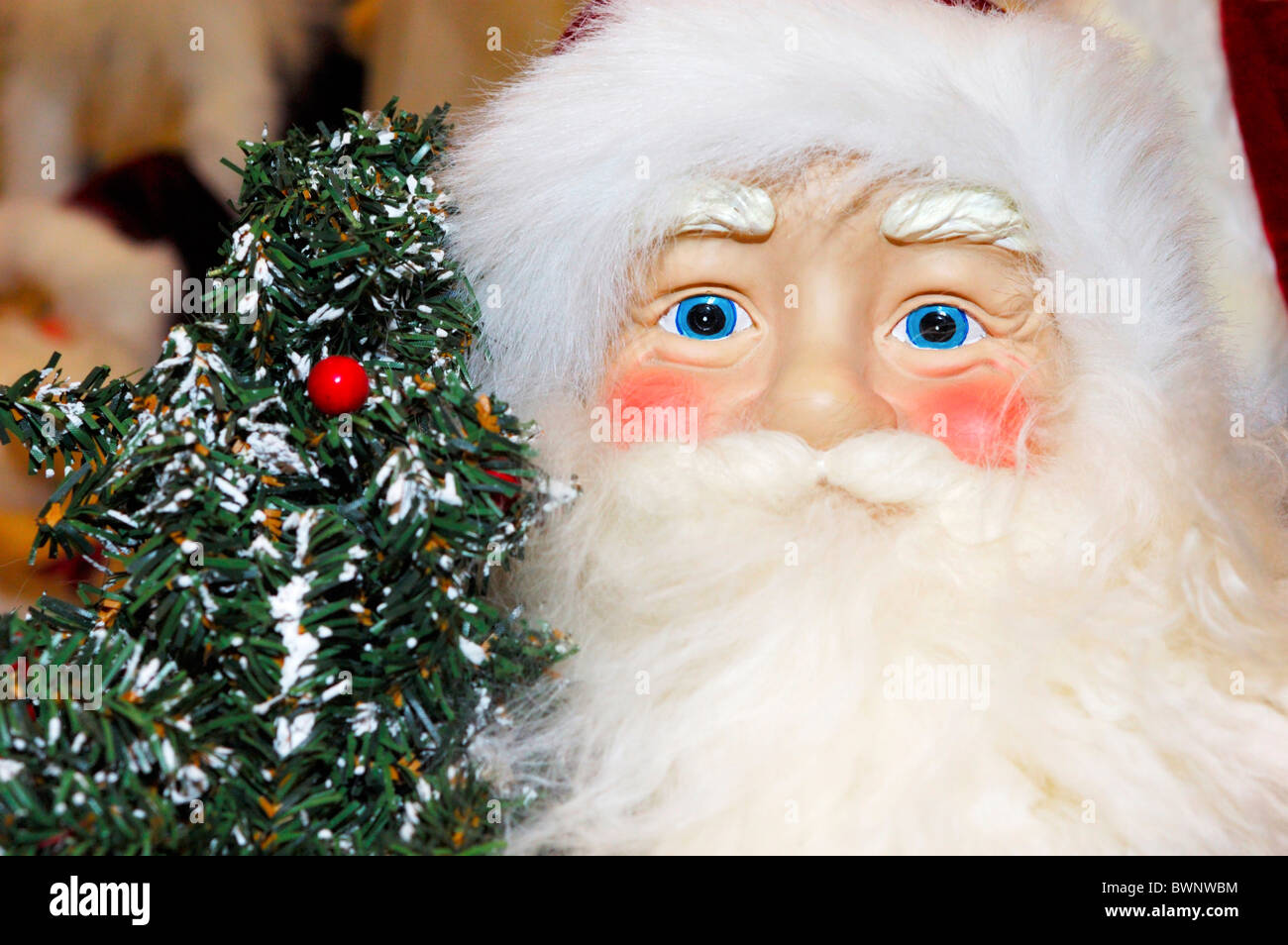 Close-up Santa with a Christmas tree Stock Photo - Alamy