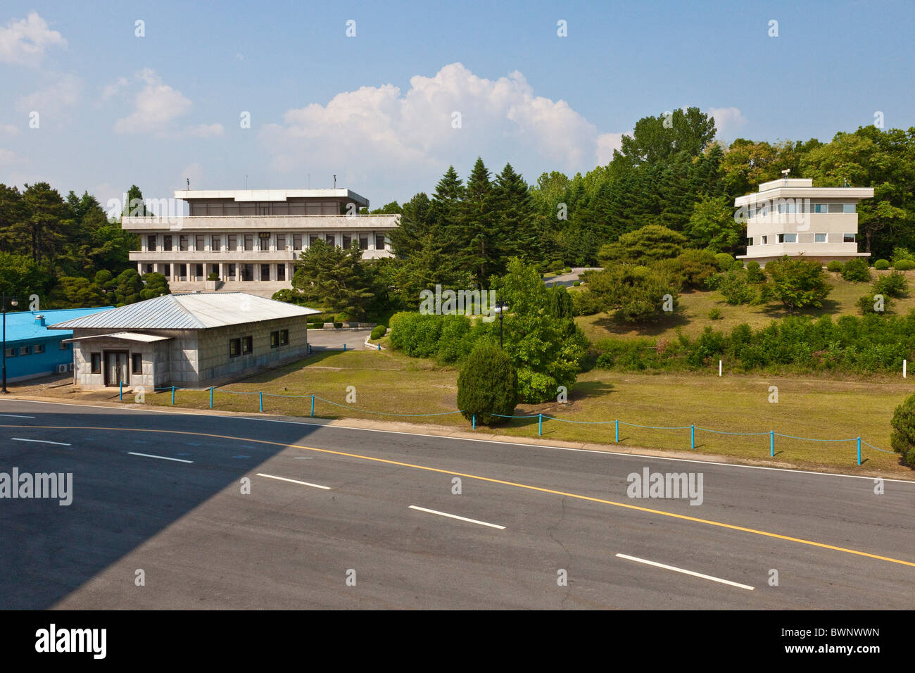 Looking over UN buildings to North Korean Panmon Hall building in JSA Joint Security Area, DMZ Demilitarized Zone. JMH3836 Stock Photo