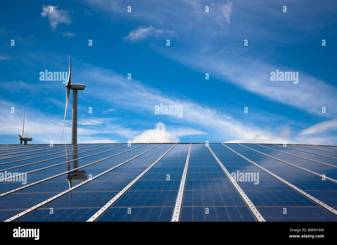 windmill and solar panel with cloud sky Stock Photo Alamy