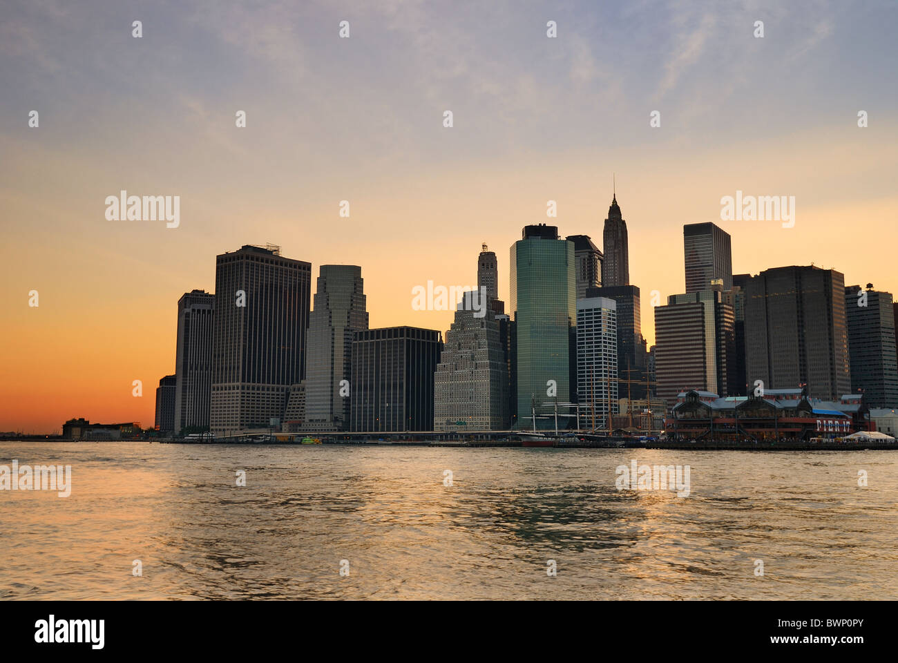 New York City Manhattan skyline at dusk over Hudson River with ...