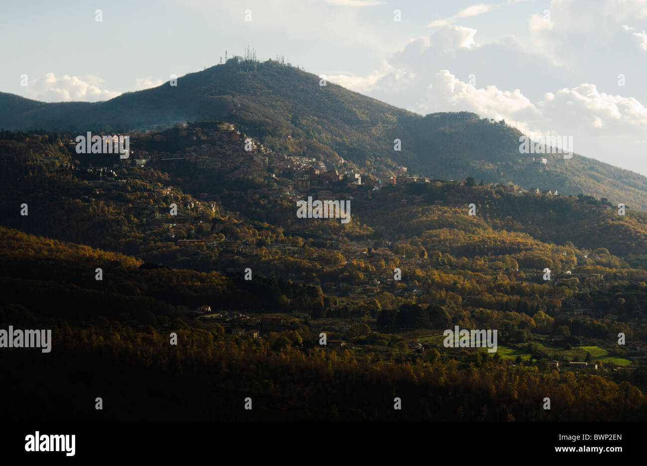 View of Rocca di Papa town and Montecavo, from mount Tuscolo, on a cloudy day, autumn season. Stock Photo