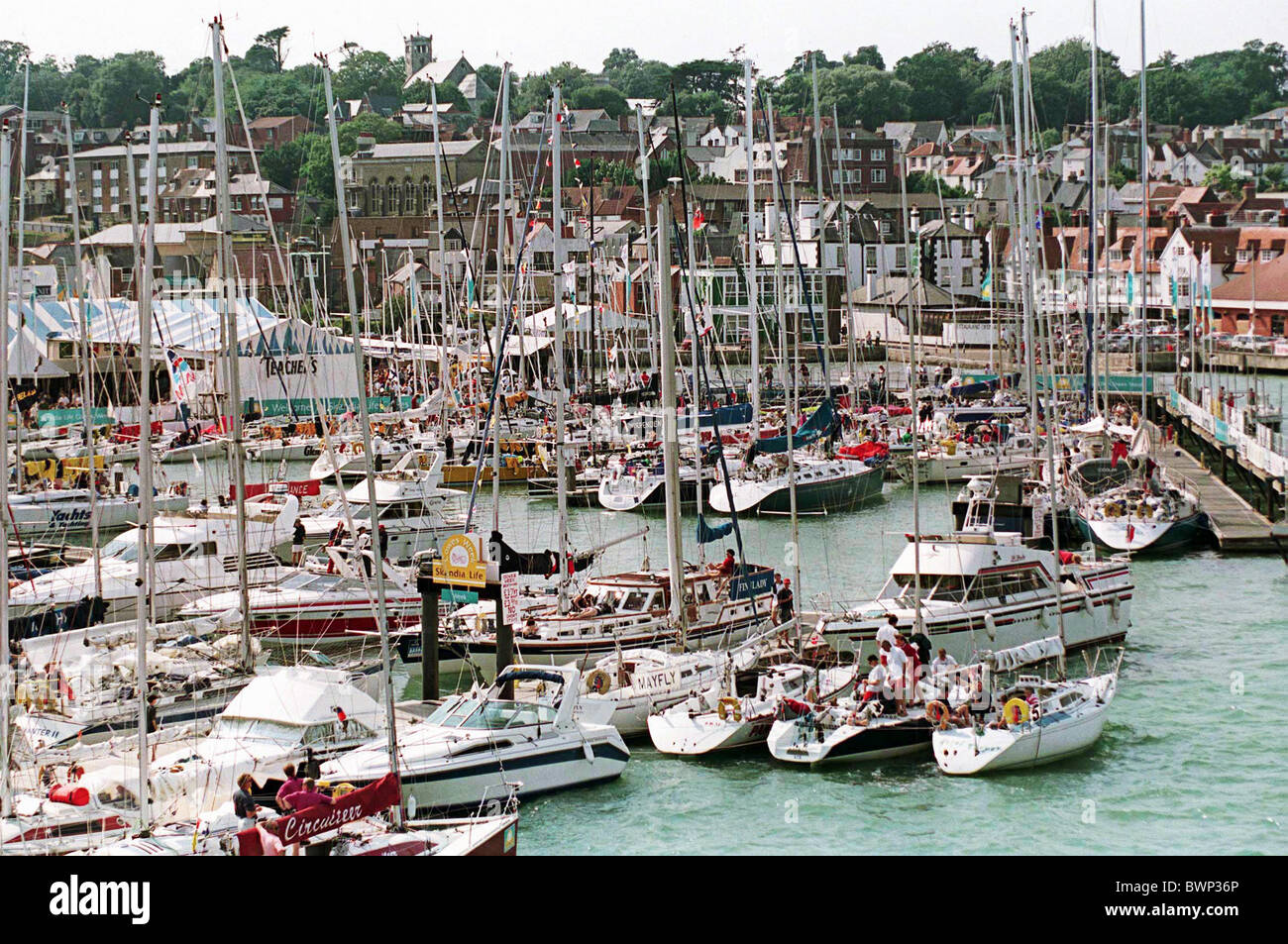 YACHTS MOORED AT COWES, ISLE OF WIGHT DURING THE ANNUAL COWES REGATTA FESTIVAL Stock Photo