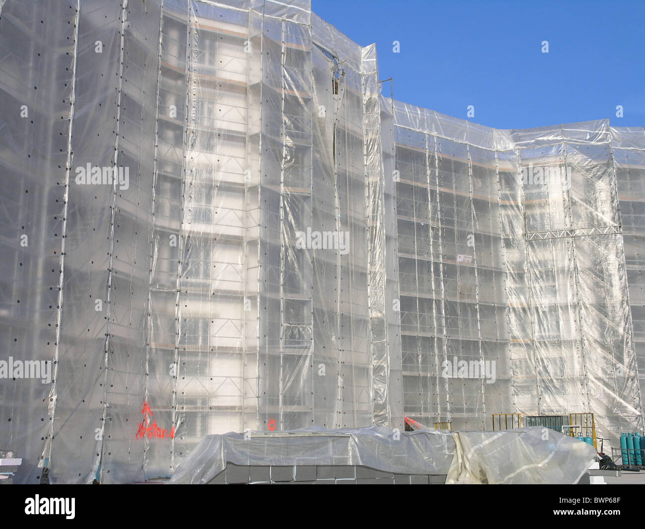 Construction site Building Scaffolding Scaffold Sheeting Structure Industry Real estate Buildings Stock Photo