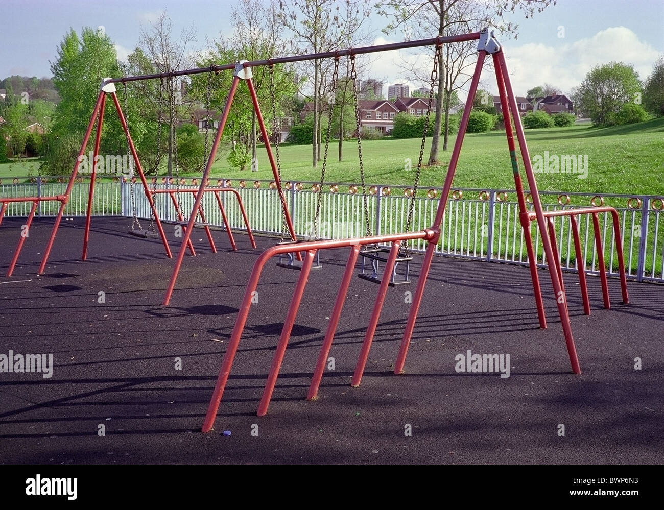 Set of Children's Swings in a Public Playground Stock Photo Alamy