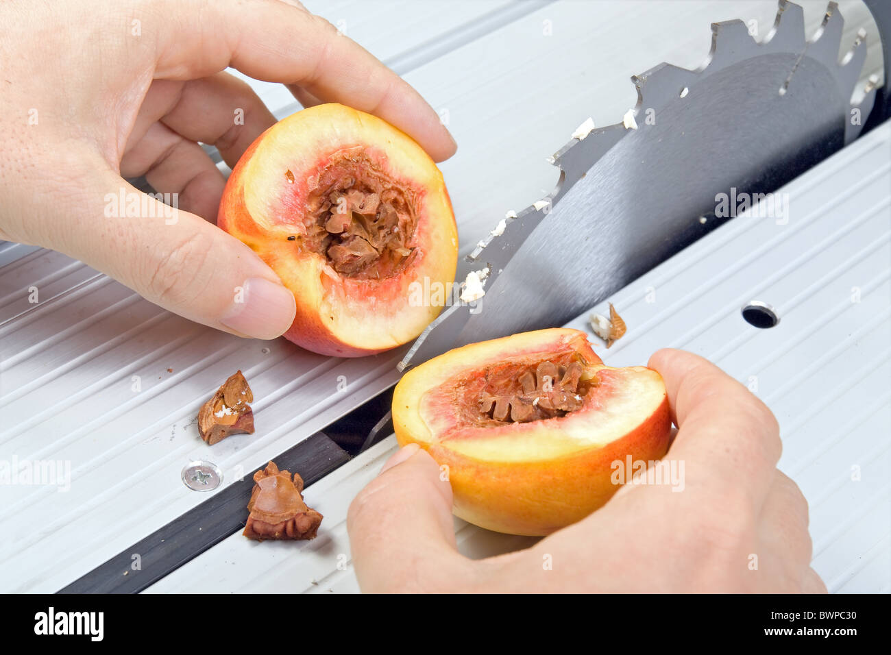 nectarine cut into half Stock Photo Alamy