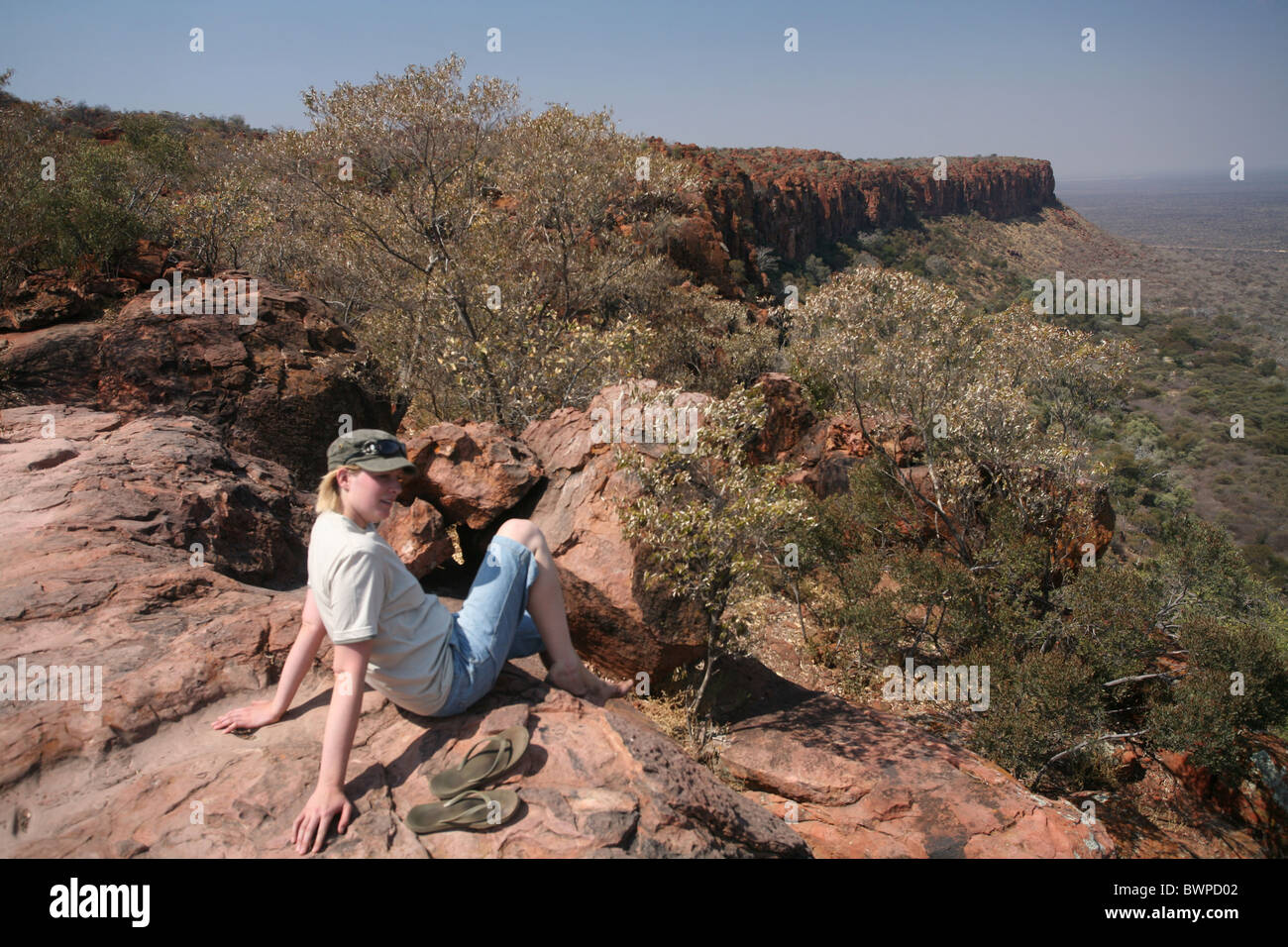 Namibia Africa Waterberg Summer 2007 Africa landscape nature mountain mountains rock woman one person sitt Stock Photo