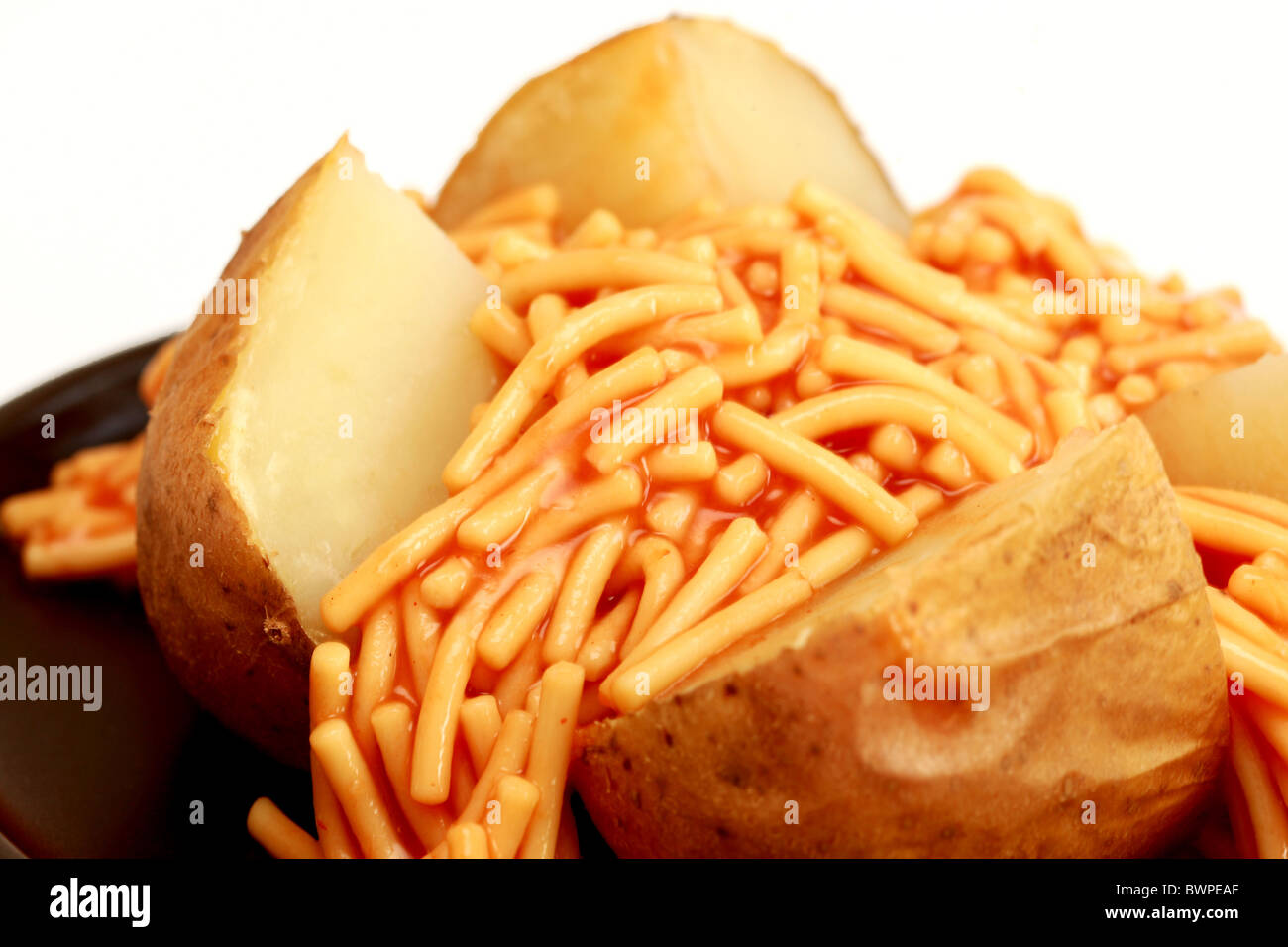 Jacket Potato with Spaghetti Stock Photo Alamy